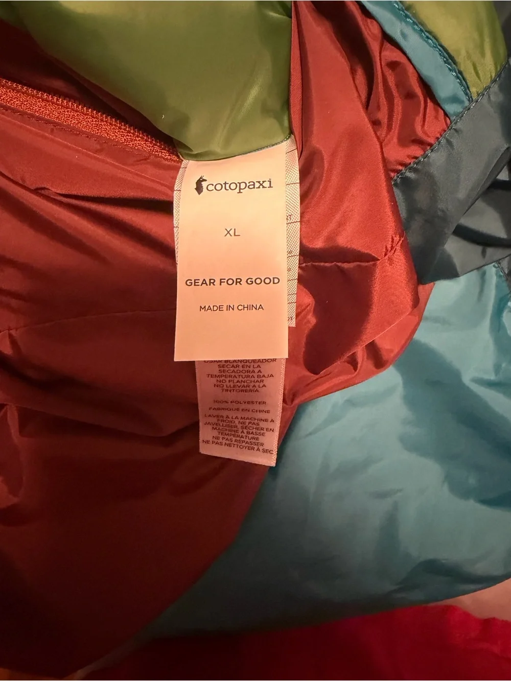 cotopaxi Teal, Light Blue, Green & Rust Colorblock Hooded Windbreaker